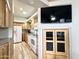 Bright kitchen with white appliances, wood cabinetry, and granite-look countertops, adjacent to the living area at 944 S Nickel Dr, Apache Junction, AZ 85119