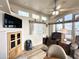 Cozy living room featuring a ceiling fan, clerestory windows, and comfortable seating at 944 S Nickel Dr, Apache Junction, AZ 85119