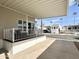 Relaxing porch offers space to enjoy the outdoors, complemented by covered parking at 944 S Nickel Dr, Apache Junction, AZ 85119