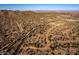 Stunning aerial view of the surrounding landscape, showing the vast open desert and distant mountains at 1 N Brenner Pass Rd, Queen Creek, AZ 85144