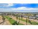 The community's golf course and residential area are seen from above at 10122 E Michigan Ave # 19, Sun Lakes, AZ 85248