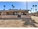 Exterior of home with a covered patio and view of the green golf course at 10122 E Michigan Ave # 19, Sun Lakes, AZ 85248