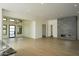 Open-concept living room featuring modern fireplace, recessed lighting, and large windows, creating bright and airy space at 12856 E Rosewood Dr, Scottsdale, AZ 85255
