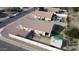 Aerial view of a single-Gathering home with fenced backyard and desert landscaping at 1624 W Minton St, Phoenix, AZ 85041
