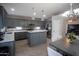 Beautiful kitchen with gray cabinets, stainless steel appliances, and marble countertops at 1624 W Minton St, Phoenix, AZ 85041