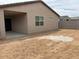 An empty backyard area, offering opportunities for custom landscaping at 17426 W Eva St, Waddell, AZ 85355