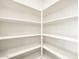 Walk-in pantry with organized shelving system for efficient storage at 17426 W Eva St, Waddell, AZ 85355