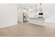 Bright living room showcasing tile flooring and modern fixtures at 17434 W Eva St, Waddell, AZ 85355