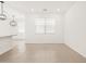 Bright living room showcasing tile flooring and recessed lighting at 17434 W Eva St, Waddell, AZ 85355