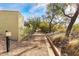 A charming dog park with desert landscaping and well-maintained walking path at 18650 N Thompson Peak Pkwy # 1028, Scottsdale, AZ 85255