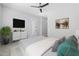 Nicely appointed bedroom featuring a comfy bed, dresser, and modern decor at 23161 E Mockingbird Dr, Queen Creek, AZ 85142