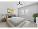 Well-staged bedroom features a cozy bed, side tables, and decorative elements at 23161 E Mockingbird Dr, Queen Creek, AZ 85142