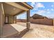Shot of covered patio looking out over the backyard at 23161 E Mockingbird Dr, Queen Creek, AZ 85142