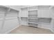 Spacious walk-in closet with ample shelving and hanging space, perfect for organization at 23161 E Mockingbird Dr, Queen Creek, AZ 85142