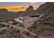 Aerial view of property featuring multiple buildings, private setting, and picturesque desert landscape at 27194 N Bear Paw Pass, San Tan Valley, AZ 85144