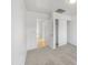 Cozy bedroom featuring neutral carpeting, a closet with sliding doors, and a door to the hallway at 29219 N Red Finch Dr, San Tan Valley, AZ 85143