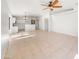 Open concept living room with tile floors and neutral paint. Lots of natural light at 29219 N Red Finch Dr, San Tan Valley, AZ 85143