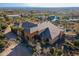 Aerial view of home featuring inviting pool and desert landscaping at 3086 N Herrala Way, Apache Junction, AZ 85119