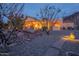 Inviting backyard with stone landscaping and gravel pathway at 3086 N Herrala Way, Apache Junction, AZ 85119