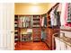 Well-organized walk-in closet with custom shelving, drawers, and ample hanging space at 3086 N Herrala Way, Apache Junction, AZ 85119