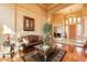 Spacious entryway with hardwood floors, elegant decor, and natural light at 3086 N Herrala Way, Apache Junction, AZ 85119