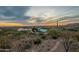 Neighborhood and landscape view in the desert. Shows desert vegetation and multiple homes at 3086 N Herrala Way, Apache Junction, AZ 85119