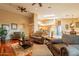Open concept living room with hardwood floors and comfortable seating area at 3086 N Herrala Way, Apache Junction, AZ 85119