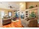 Cozy living room features a fireplace, wood floors, and comfortable seating at 3086 N Herrala Way, Apache Junction, AZ 85119