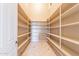 Spacious pantry with ample shelving and tile flooring for organized storage at 3086 N Herrala Way, Apache Junction, AZ 85119