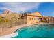 Backyard pool with mountain views and privacy fence at 3086 N Herrala Way, Apache Junction, AZ 85119