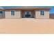 Spacious backyard featuring a covered patio and ample room for outdoor activities and customization at 31476 N Hayweather Ln, San Tan Valley, AZ 85143