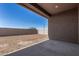 Backyard showcasing a blank canvas with a block wall, ready for custom landscaping and outdoor living at 31476 N Hayweather Ln, San Tan Valley, AZ 85143