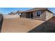 Backyard featuring a blank canvas with a block wall, ready for a personalized landscaping design at 31476 N Hayweather Ln, San Tan Valley, AZ 85143