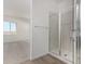 Bathroom including a modern shower with a sliding glass door at 31476 N Hayweather Ln, San Tan Valley, AZ 85143