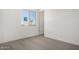 Bedroom with carpet floors and natural light at 31476 N Hayweather Ln, San Tan Valley, AZ 85143