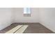 Bedroom with tile floors and natural light at 31476 N Hayweather Ln, San Tan Valley, AZ 85143