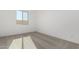 Bedroom with carpet floors and a window at 31476 N Hayweather Ln, San Tan Valley, AZ 85143