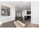 Open-concept with windows and stainless-steel appliances at 31476 N Hayweather Ln, San Tan Valley, AZ 85143