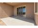 Covered patio with sliding glass doors, offering seamless indoor-outdoor living at 31476 N Hayweather Ln, San Tan Valley, AZ 85143