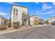 Contemporary two-story home featuring modern architecture, neutral stucco exterior, and low-maintenance desert landscaping at 367 N 157Th Ln, Goodyear, AZ 85338