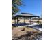 Community picnic pavilion offers shaded seating, a grill, and common area at 367 N 157Th Ln, Goodyear, AZ 85338