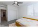 Comfortable bedroom with natural light, closet and view to another room at 651 N Ironwood Dr # 1, Apache Junction, AZ 85120