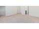 Spacious bedroom with neutral colored carpet and ensuite bathroom at 6722 W Desert Dr, Laveen, AZ 85339
