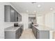 Bright kitchen with stainless steel appliances and granite countertops at 6722 W Desert Dr, Laveen, AZ 85339