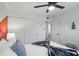 Comfortable bedroom with neutral colors and a view into the bathroom at 7407 E Polk St, Scottsdale, AZ 85257