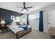 Cozy bedroom with modern accents, a comfortable bed, and plenty of natural light from the window at 7407 E Polk St, Scottsdale, AZ 85257