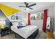 Bright bedroom with modern accents, a comfortable bed, and plenty of natural light at 7407 E Polk St, Scottsdale, AZ 85257