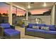 Beautifully designed outdoor patio with a full kitchen, comfortable seating, and a cozy ambiance, perfect for gatherings at 7407 E Polk St, Scottsdale, AZ 85257