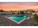 Beautiful pool with a stunning view, comfortable seating, and a landscaped yard at 7407 E Polk St, Scottsdale, AZ 85257