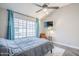 Bright bedroom with vaulted ceiling, ample natural light, and cozy seating area at 7675 E Mcdonald Dr # 222, Scottsdale, AZ 85250